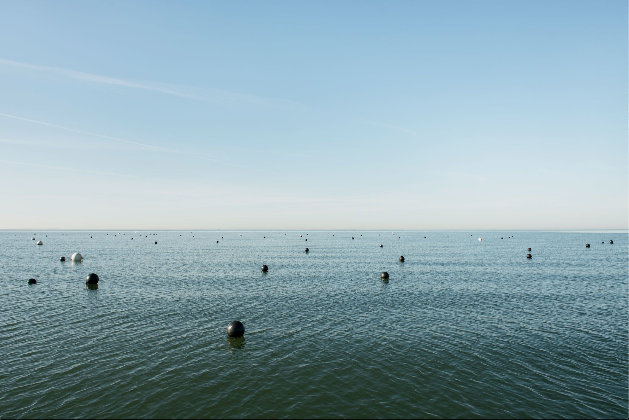 BUOYS FLOATING on water
