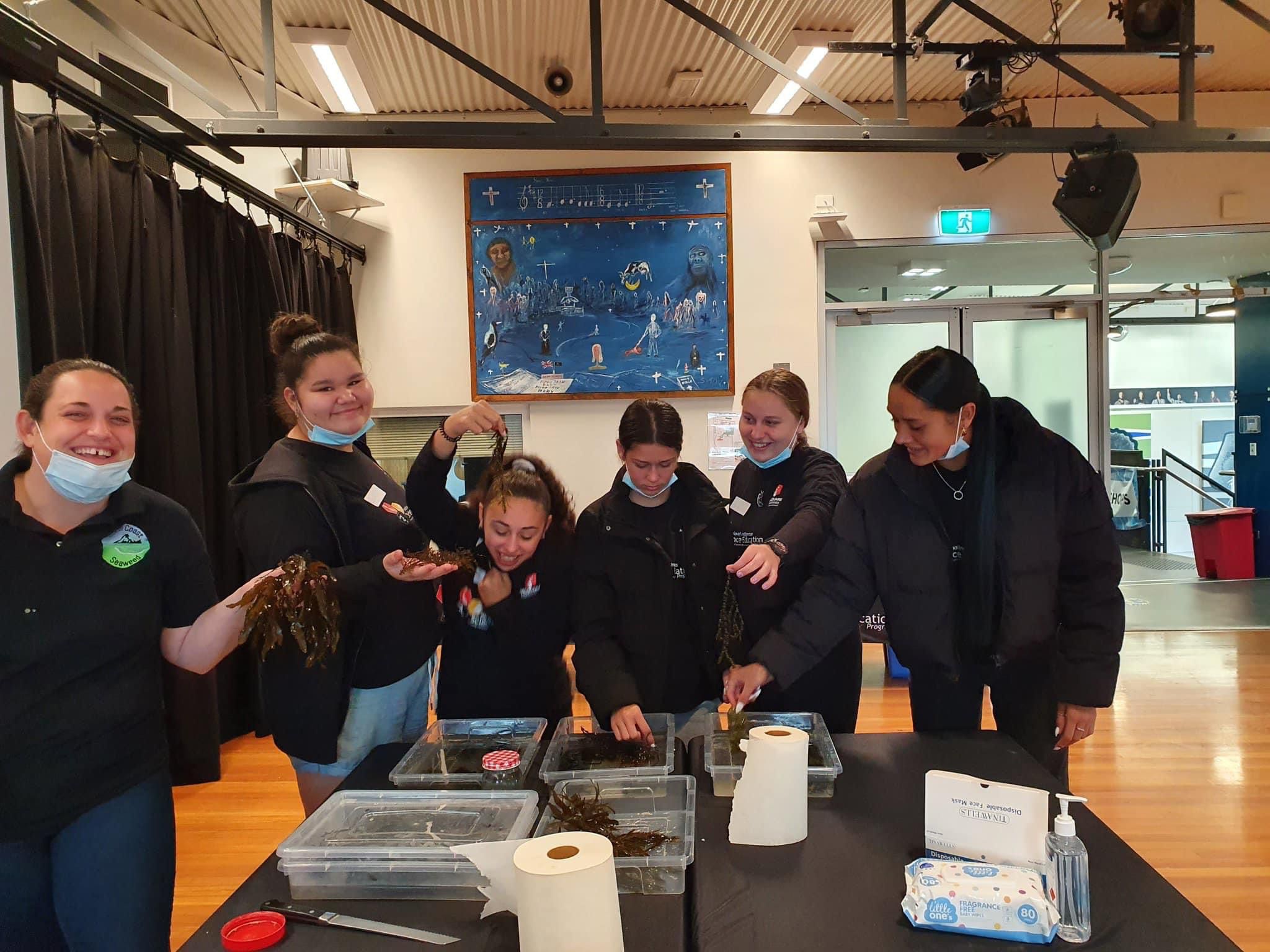 group of indigenous kids learning